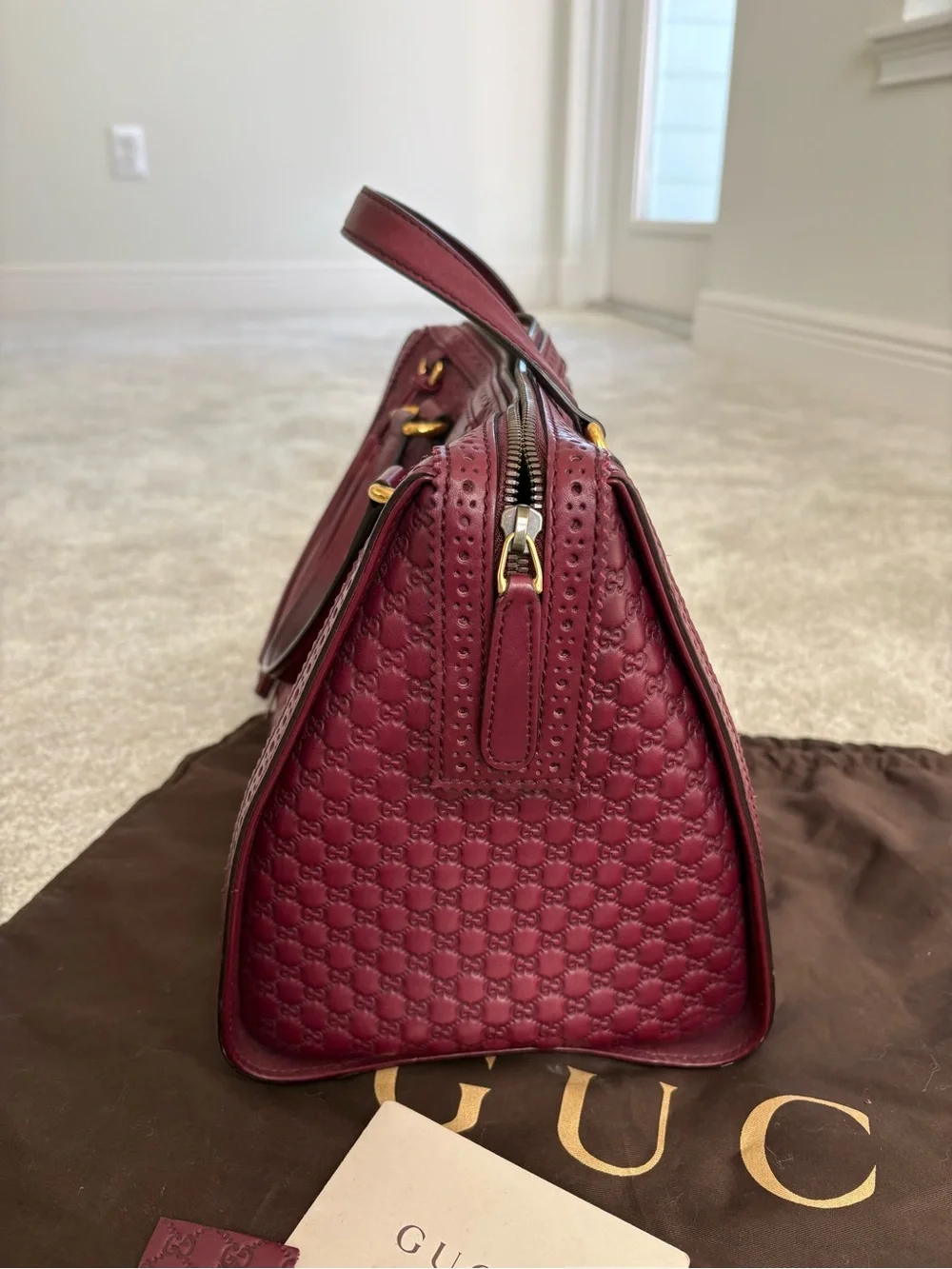 Gucci Burgundy Leather Tassel Satchel with Embossed Monogram